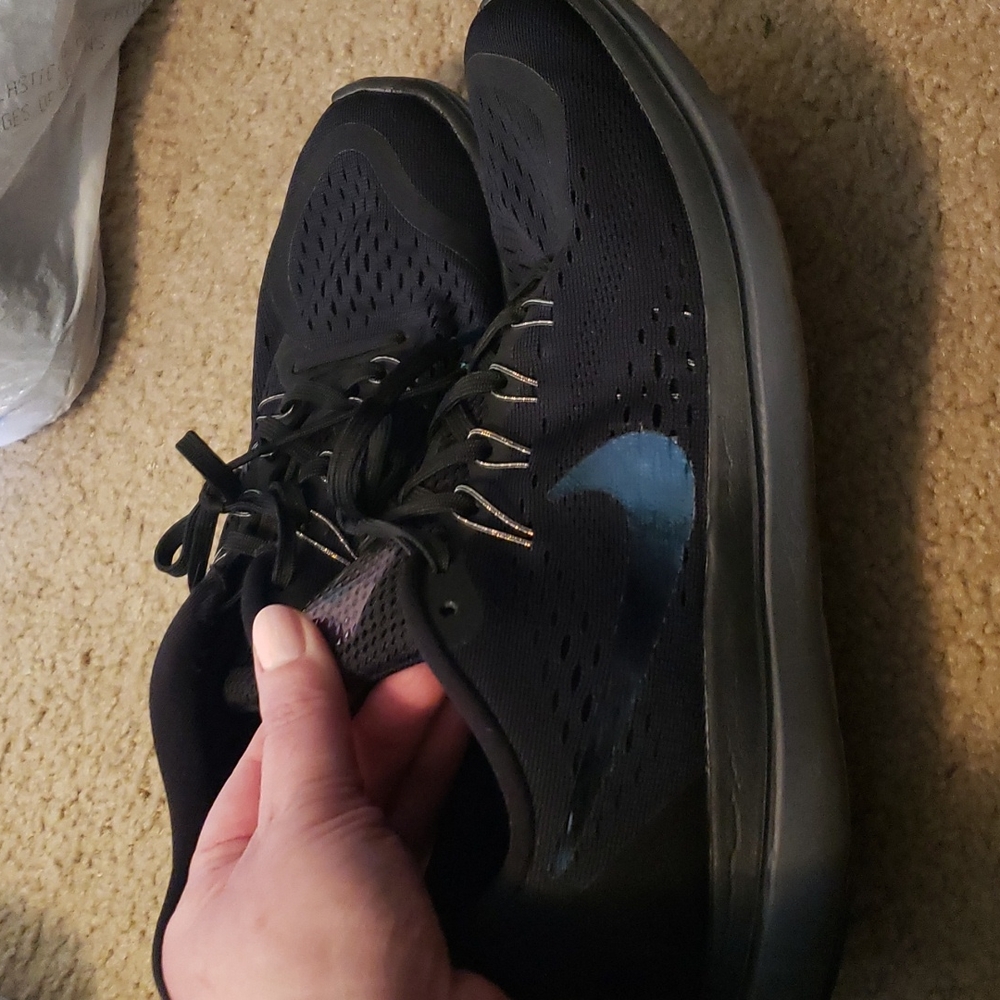 Nike Women's Black Athletic Shoes with Blue Swoosh